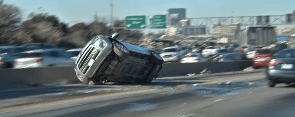 A rollover car accident on a busy Texas highway